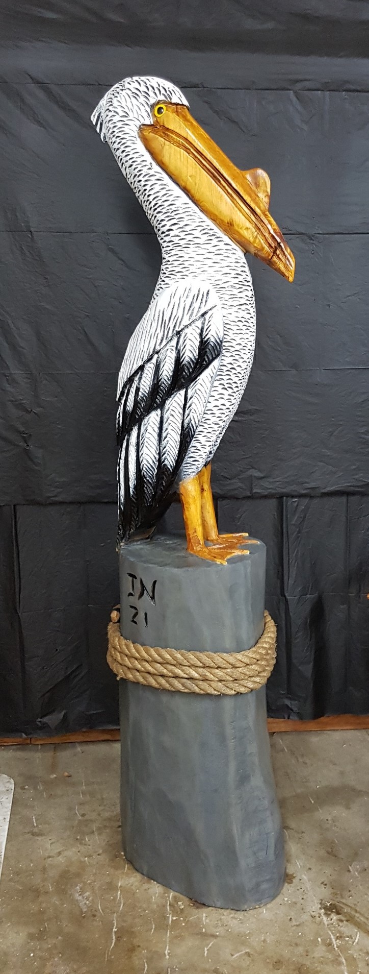 Chainsaw carved Pelican with rope