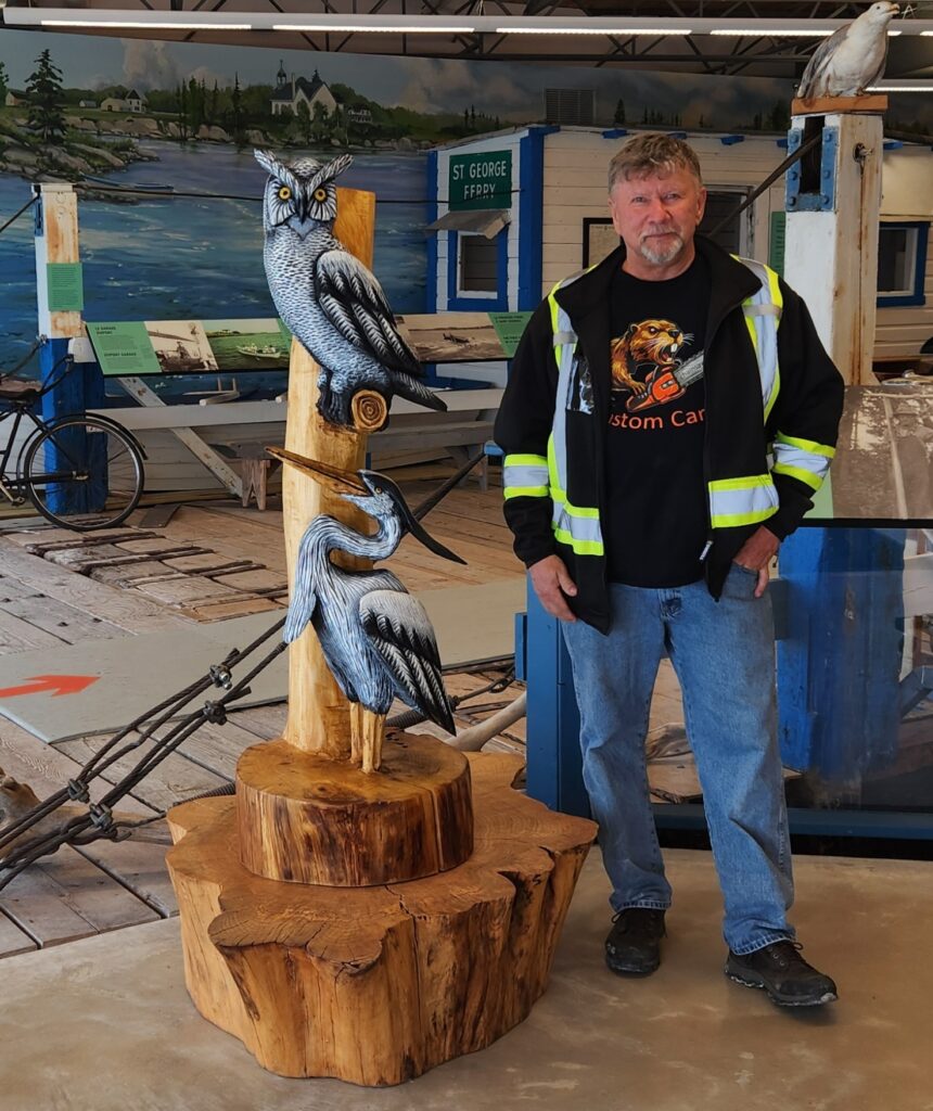 Carving of heron and owl